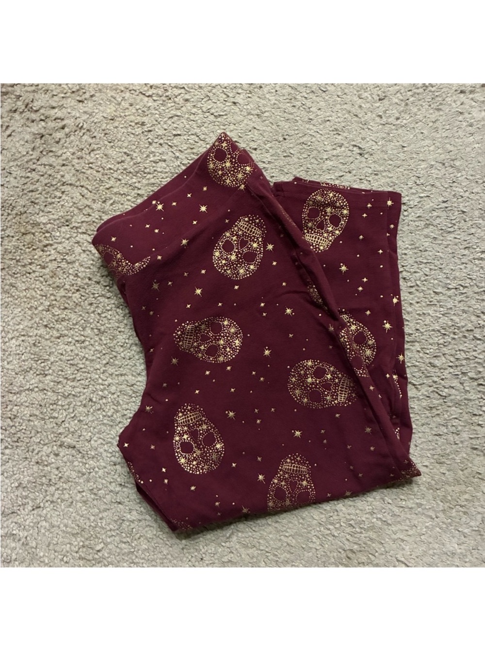Torrid metallic skull leggings